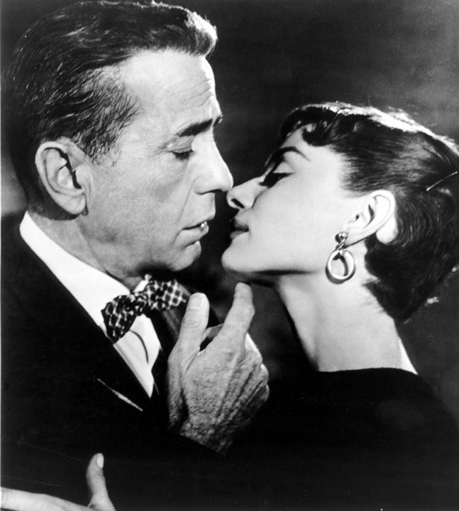 Humphrey Bogart et Audrey Hepburn dans le film Sabrina, de Billy Wilder © Les Acacias Humphrey Bogart et Audrey Hepburn dans le film Sabrina, de Billy Wilder © Les Acacias