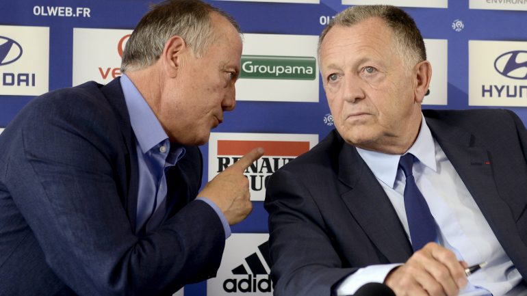 Bernard Lacombe et Jean-Michel Aulas, à l’OL, en 2013 © Philippe Desmazes / AFP