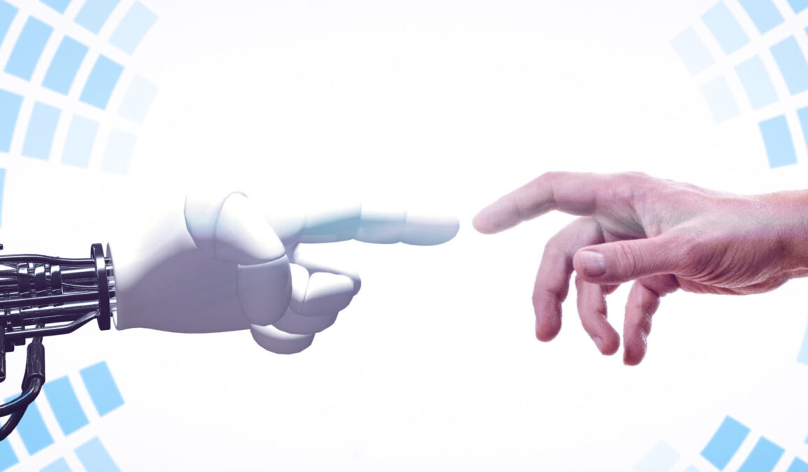main humaine et main de robot qui se rejoignent